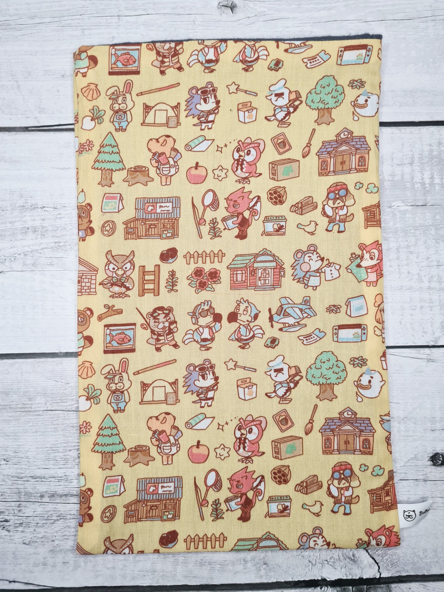 pochetet a livre animal crossing jaune de la marque bellette workshop