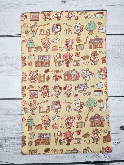 pochetet a livre animal crossing jaune de la marque bellette workshop