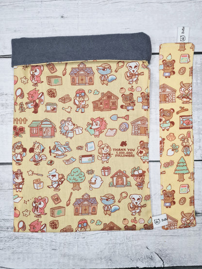 Pochette a livre animal crossing et son marque-page en tissu assorti de la marque bellette workshop